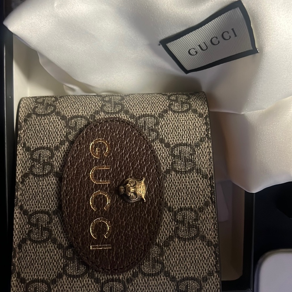 Brand New Gucci wallet, never been used, still in the box.